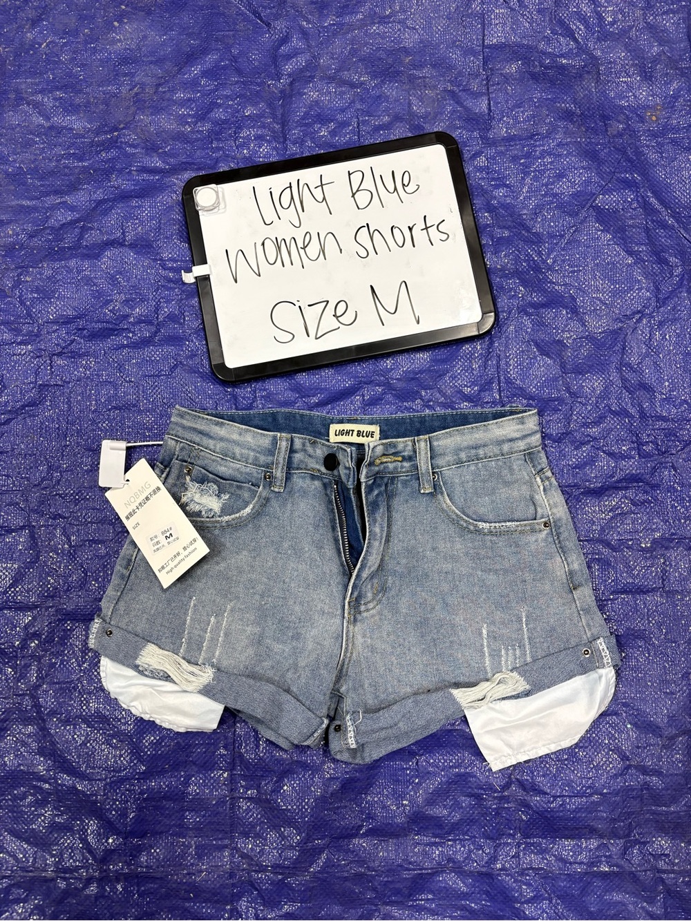 Light Blue Distressed Denim Roll-Hem Women's Shorts